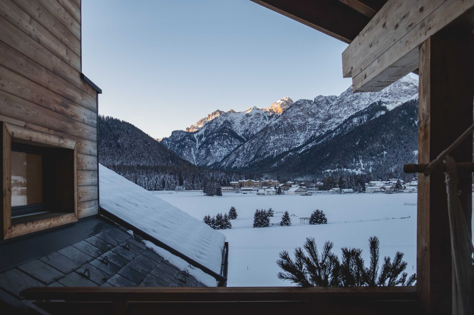 Serene lodge interior overlooking landscape